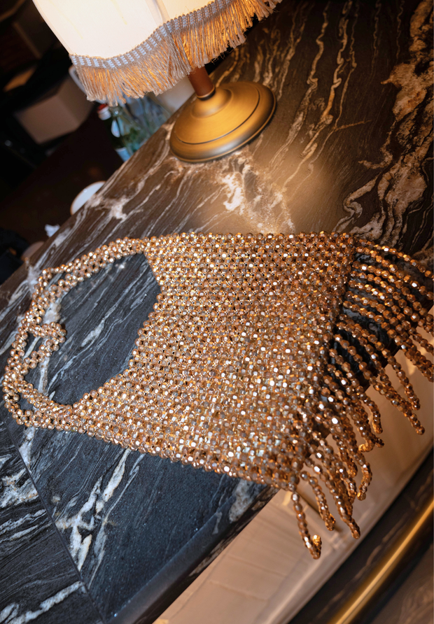 Bolso dorado Miralena